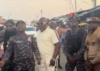 Police officers team up with Bukom Banku to promote peace